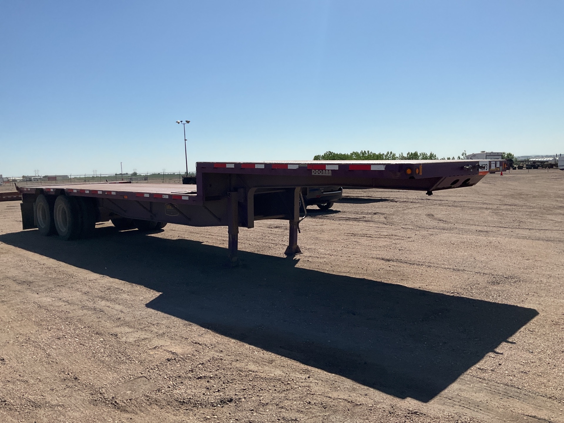 2012 Doonan 402DBBBZGFCZ 40 ft T/A Single Drop Step Deck Trailer