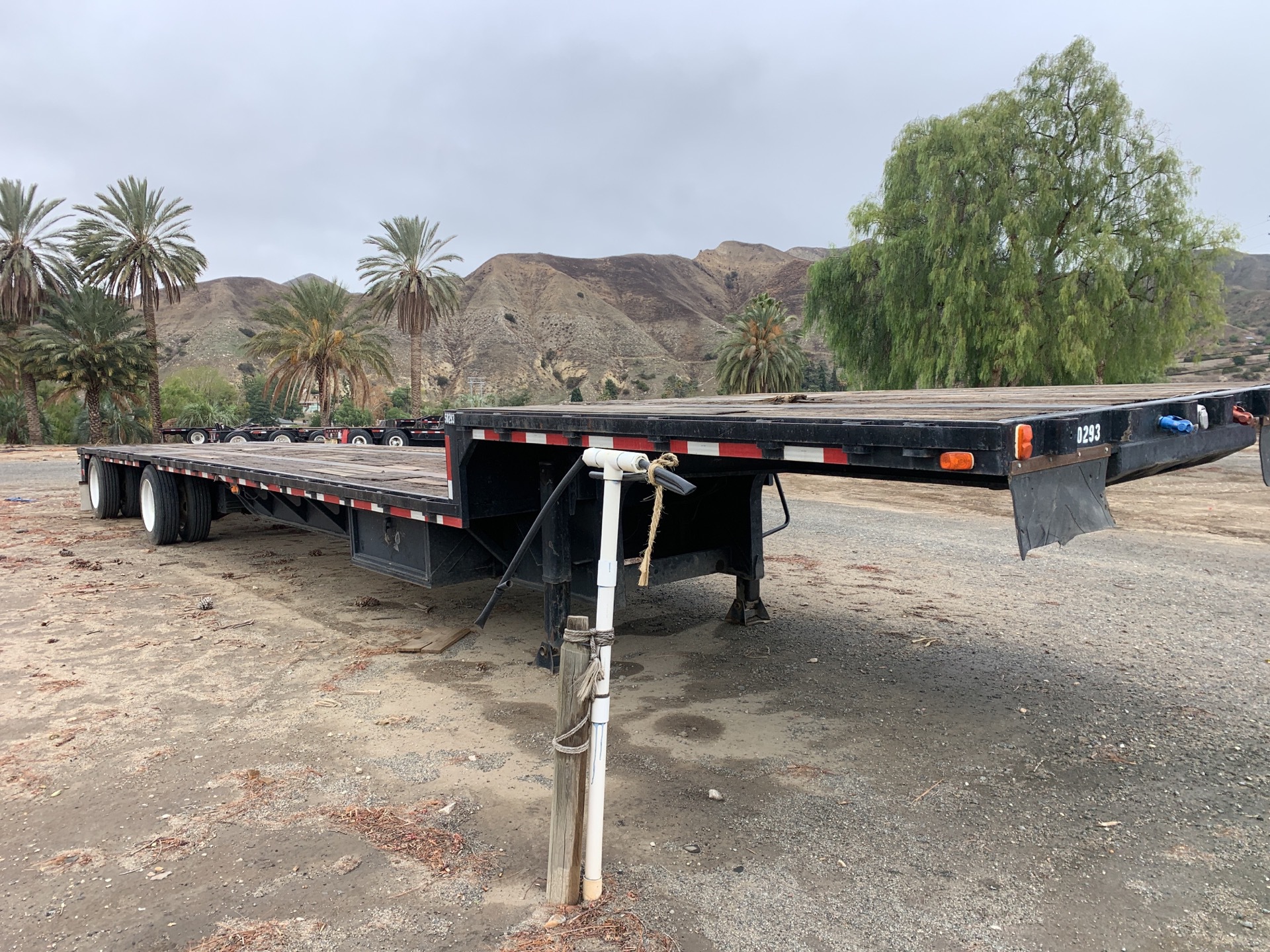 1999 Dorsey 48 ft T/A Spread Axle Single Drop Step Deck Trailer