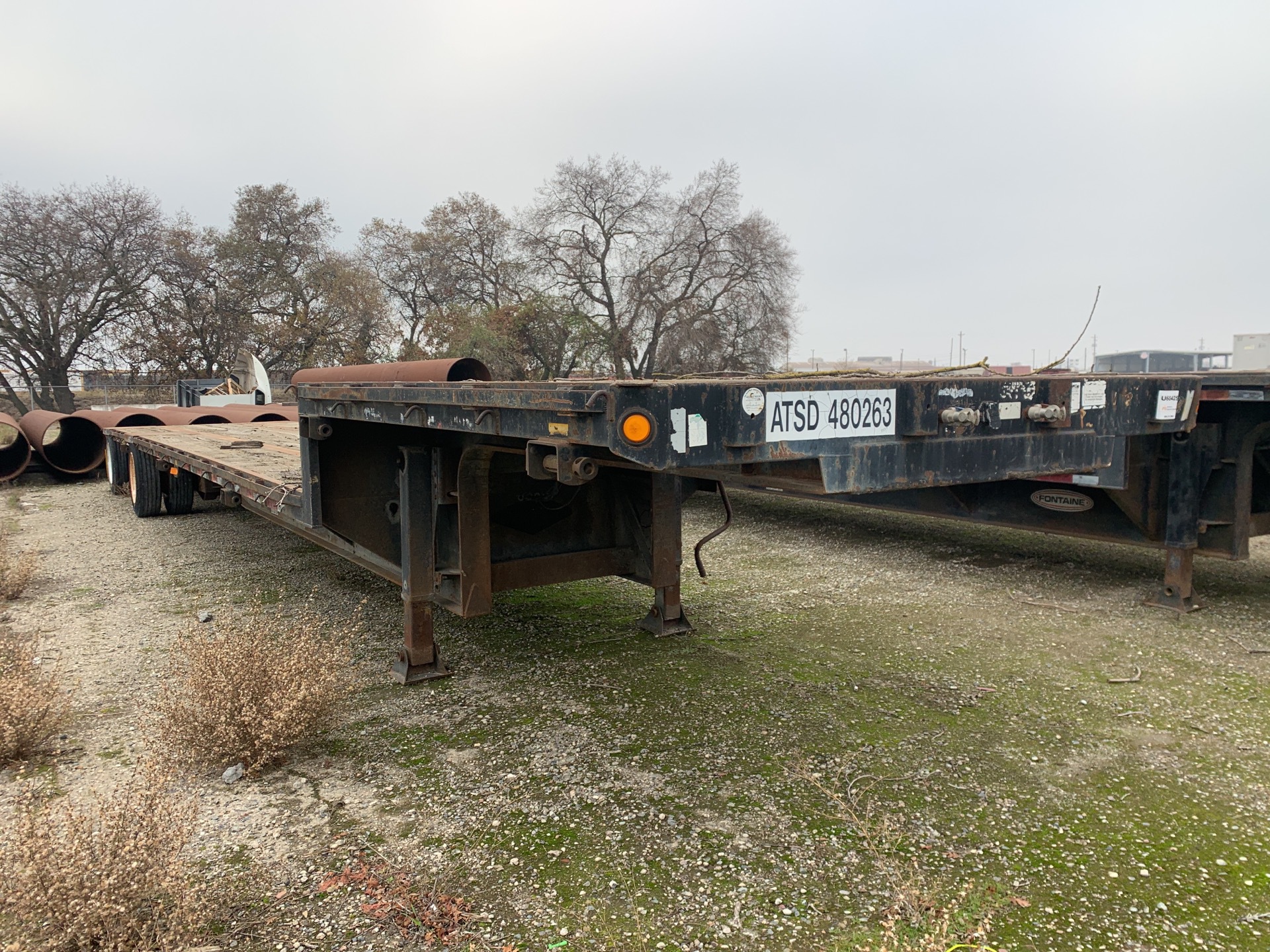1996 Fontaine DFT-5-8048WSAW 48 ft T/A Step Deck Trailer