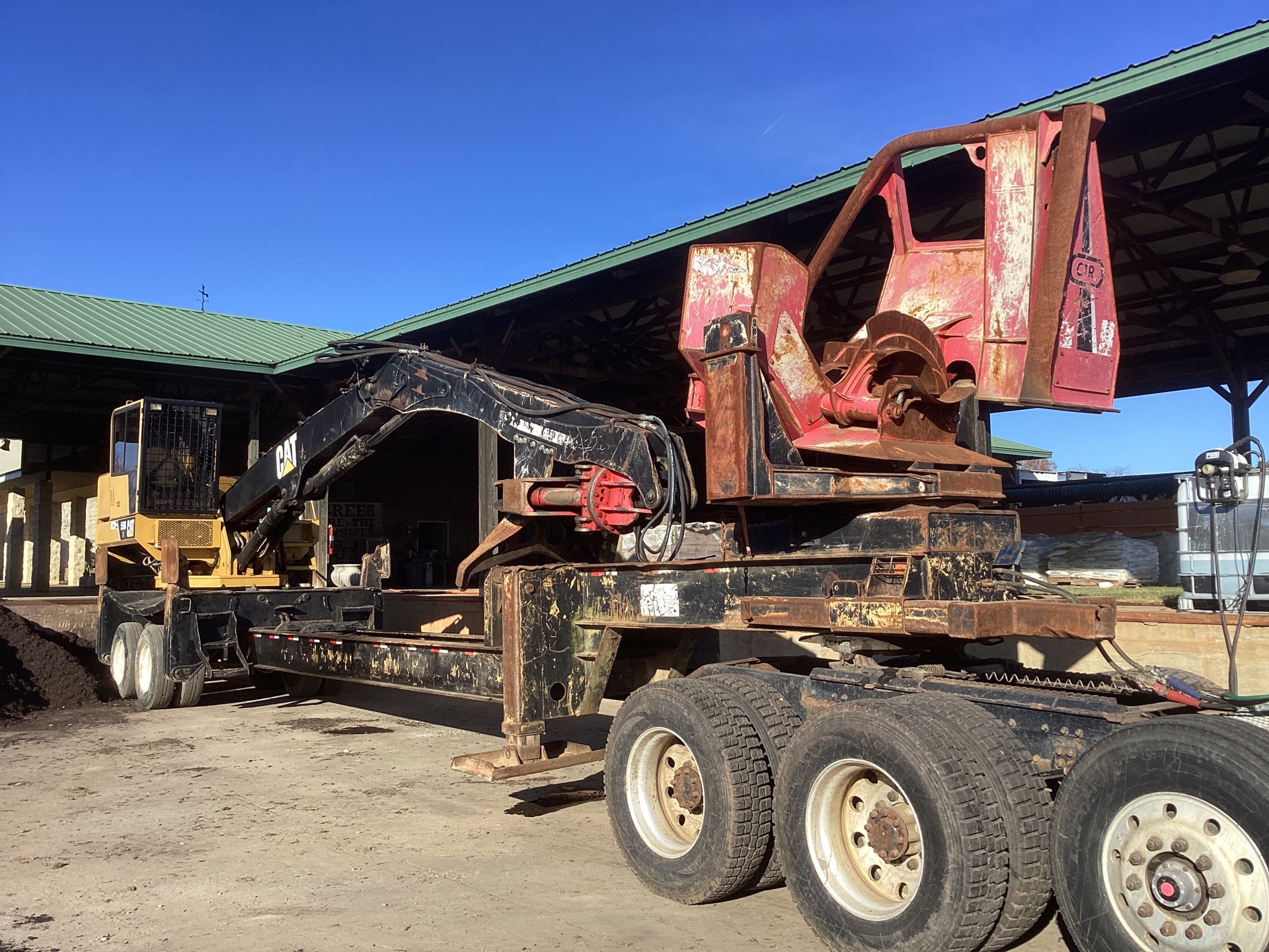 2012 Cat 559B-DS Trailer Mounted Log Loader